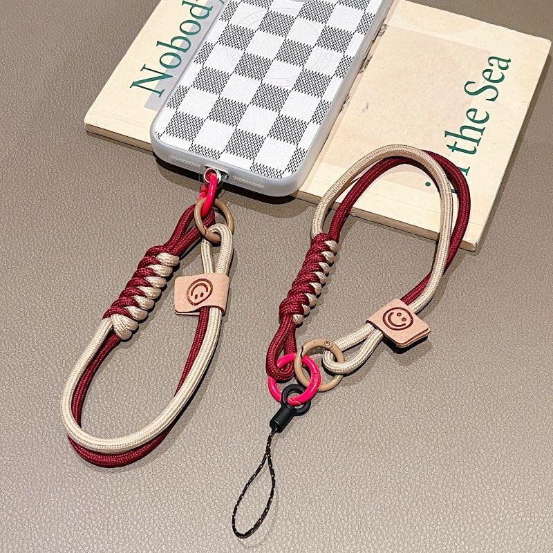 New Short Phone Lanyard With British Style Contrasting Color Weaving and Fashionable Smiling Face Wrist Strap for Phone Cases