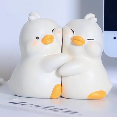 2 figuras de patos adorables para sujetar libros, decoración de escritorio para el hogar, artesanías de resina, estatuillas de animales encantadoras para dormitorio, accesorios, regalos.