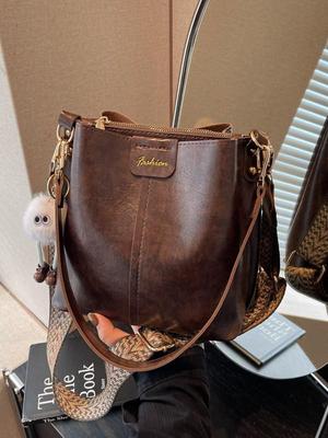 2025 Korean High-End Versatile Bucket Bag: Retro Niche Design with Wide Strap for Autumn/Winter