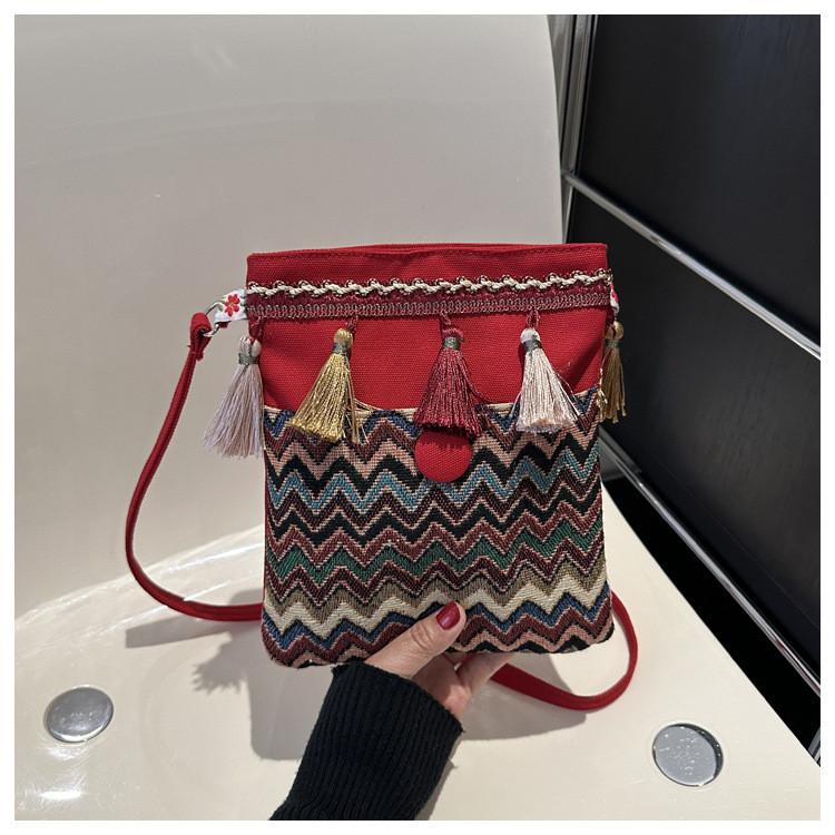 Ethnic Style Canvas Small Crossbody Bag With Wave Patterns And Decorative Tassels For Casual Outings