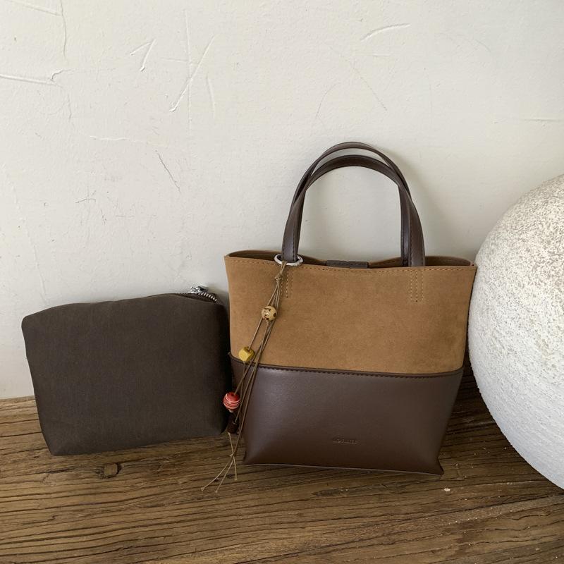 Premium sense of foreign style small bag women's autumn and winter versatile 2025 new shoulder messenger bag popular portable bucket bag