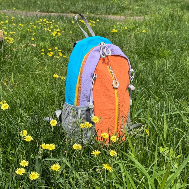 Schoolbag new outdoor color contrast sports mountaineering bag high value travel backpack large capacity fashion simple color contrast backpack