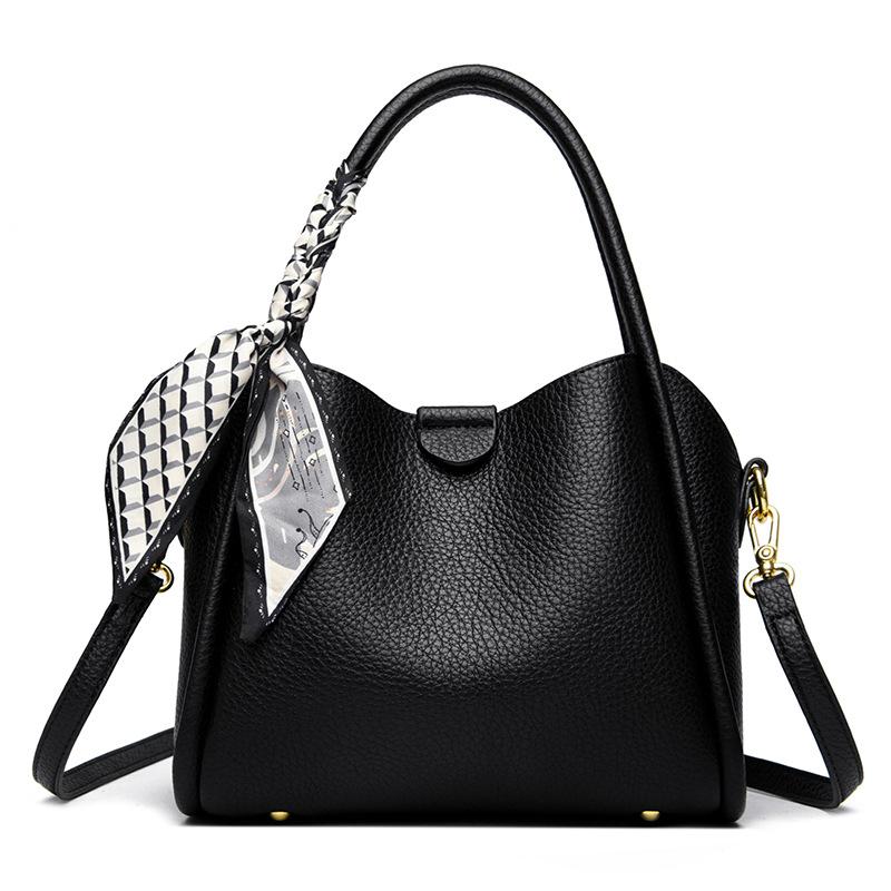 This Bucket Bag Is A Simple and Fashionable Urban Design with A Lychee Pattern and A Silk Scarf. It Is A Hand-held Shoulder Bag