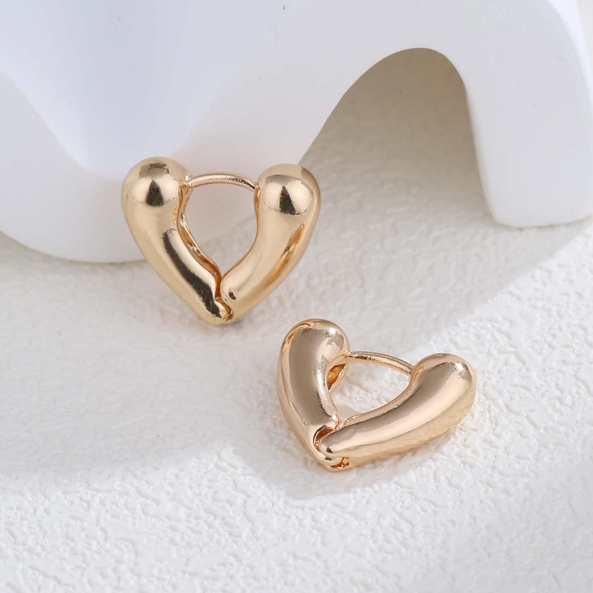 

Стильные и простые, глянцевые серьги-гвоздики, застежки-пряжки, изысканный и миниатюрный женский дизайн, универсальный характер и высококачественные серьги в форме сердца.