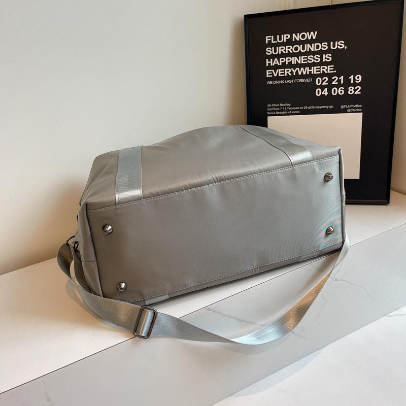 Korean version of fashion short-distance travel bag women's shoulder carry large-capacity luggage travel business travel bag men