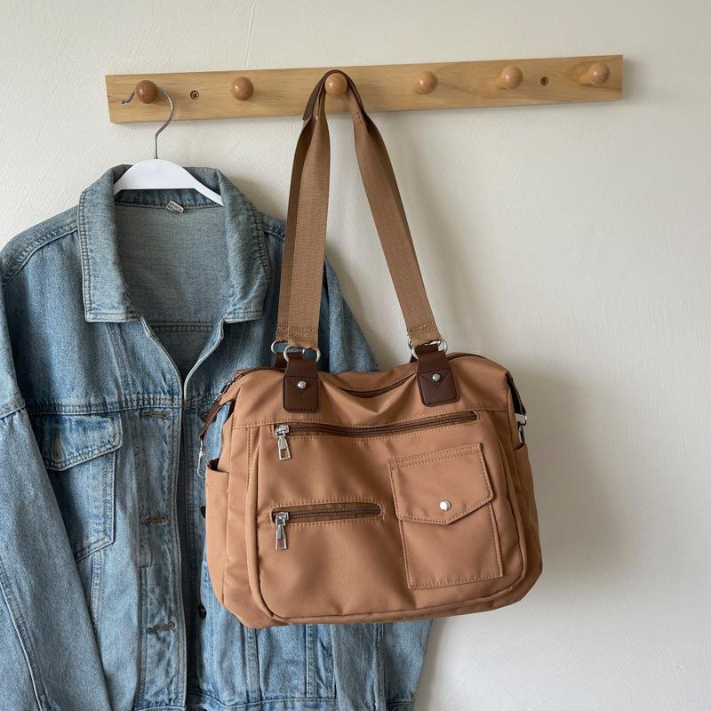 2025 new mailman large-capacity fashion simple women's lightweight shoulder bag handbag multi-functional tutoring bag bag