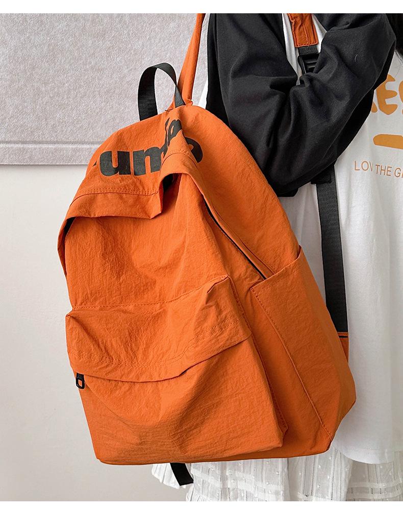 Lightweight Minimalist Backpack for Female Students: Versatile Double-Shoulder Bag for School and Travel.