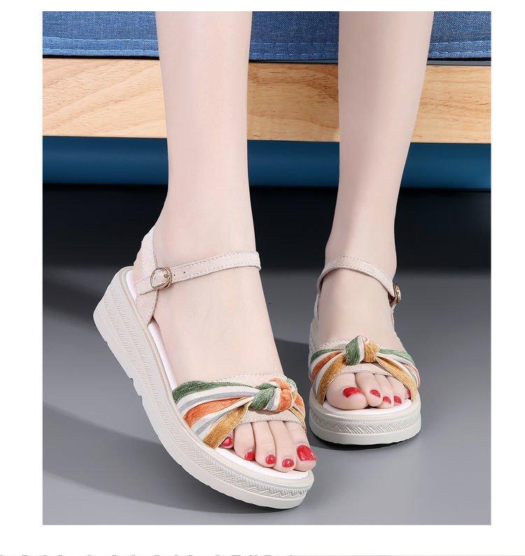 

In the summer of 2025, the new wedge heel thick-soled muffin fairy style middle heel fashion versatile flat-soled sandals women s skirt 40