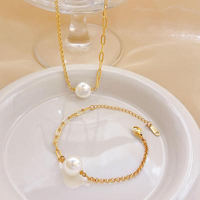 Pearl Oval Gold Bean Titanium Steel Bracelet/Necklace: Women's Fashionable Non-Fading Jewelry with an Internet Celebrity Niche Design.