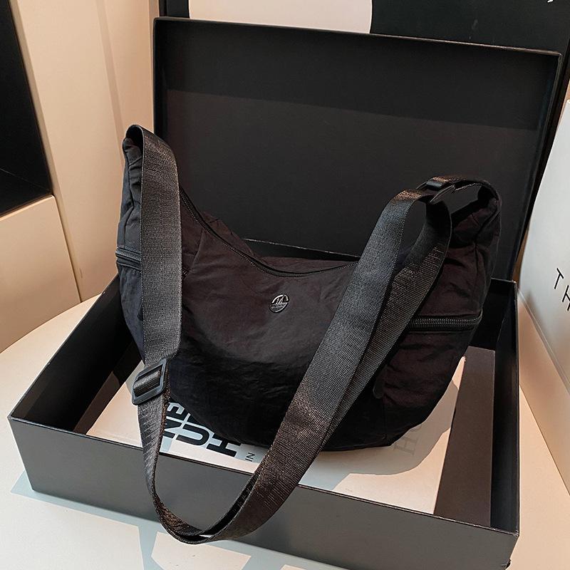 

New fashion summer new personalized dumpling bag women s fashion versatile students class shopping large capacity messenger bag чёрный