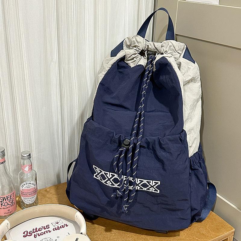 

Badminton backpack Women s travel schoolbag Drawstring pocket Lightweight outdoor sports mountaineering bag темно-синього кольору