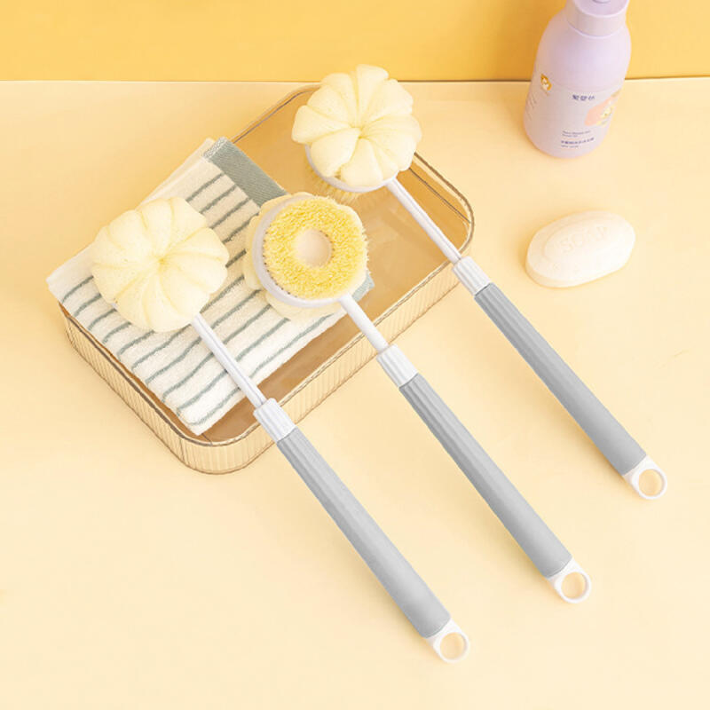 Double-sided body brush, shower ball, and foaming shower towel