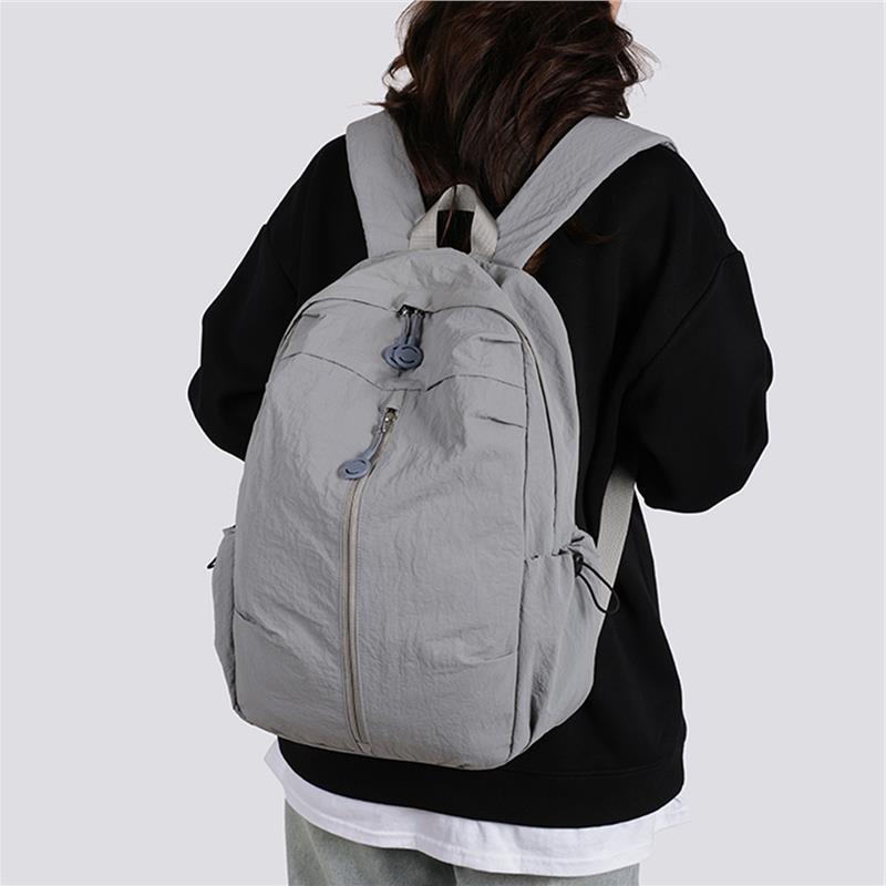 Schoolbag1011 new simple and lightweight student schoolbag for men and women to work commuting business travel backpack travel bag large capacity