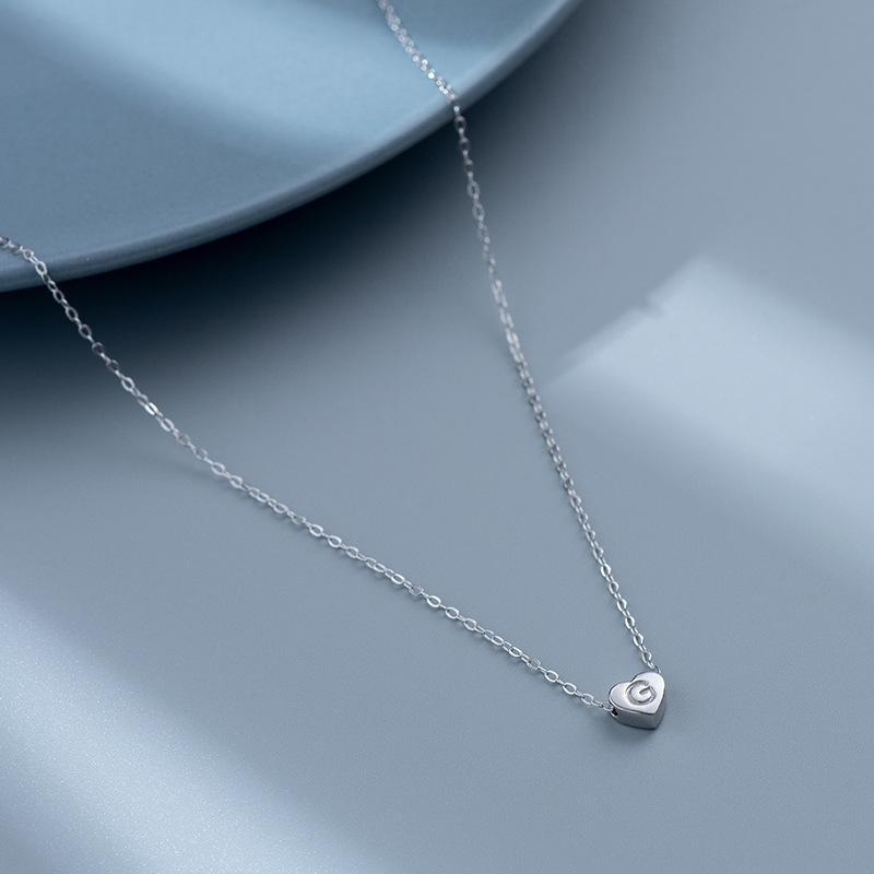 S925 Silver Heart-Shaped Initial Necklace - Korean Style Clavicle Chain with Trendy Peach Heart Design.