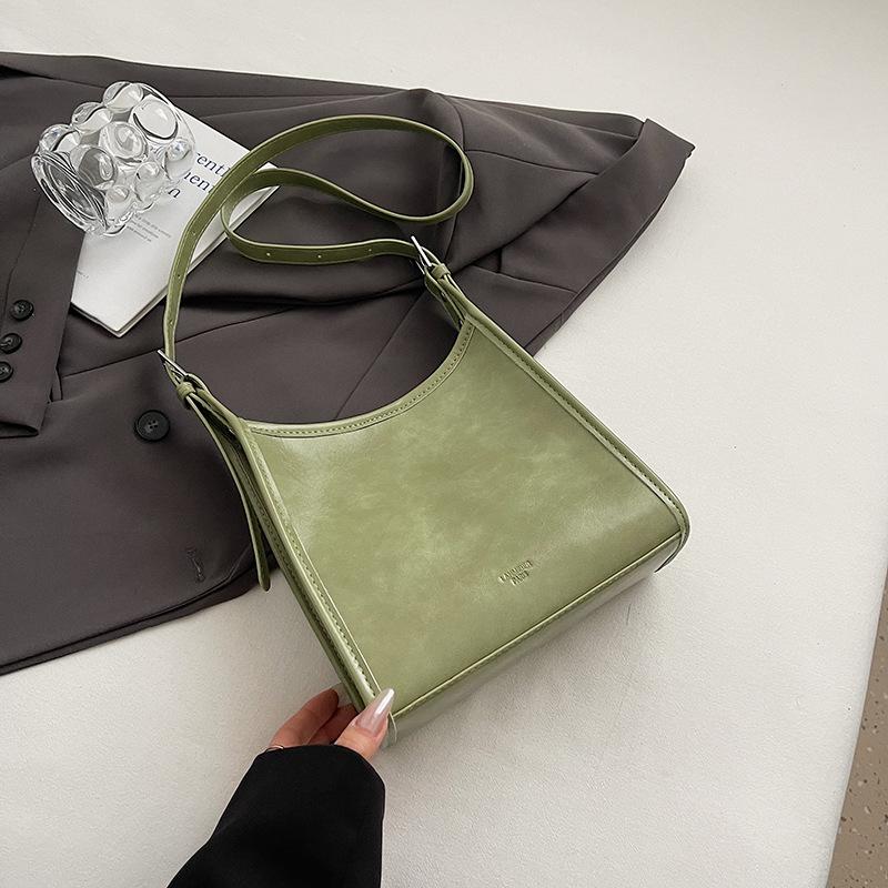 Premium feeling hand carrying bucket bag women's Korean version fashion versatile shoulder bag 2025 spring and summer new simple casual women's bag