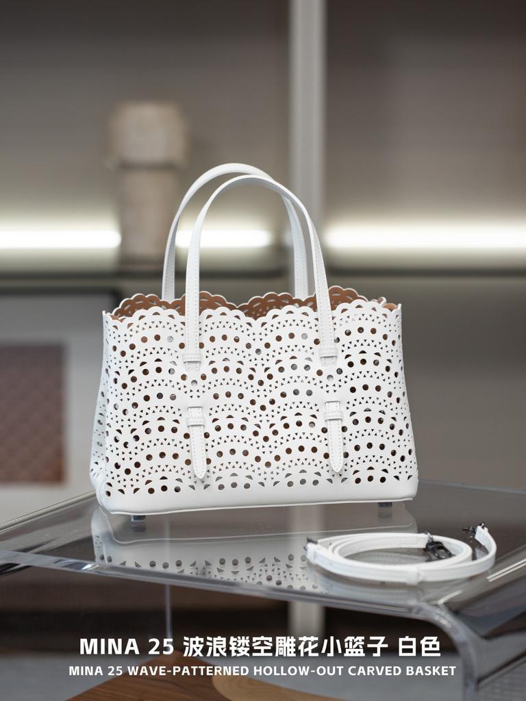 Armrest 25 New High-Grade Small Tote Bag Fashion Hollow Out Floral Cow Leather Linen Thread Real Leather Womens Bag