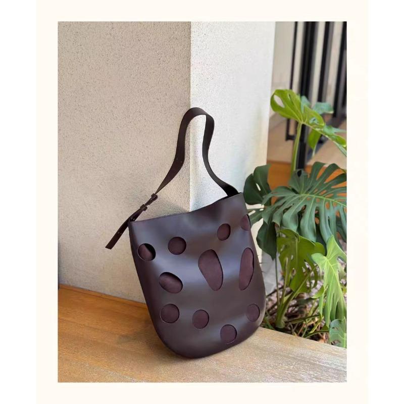 Design autumn new large-capacity first-layer cowhide leather messenger large bag commuter bucket bag computer bag