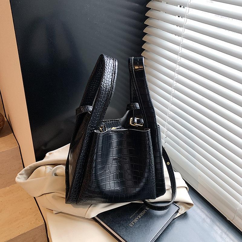 

Crocodile pattern niche simple handbag bag women s summer new high-end messenger bucket bag чорний