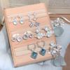 Star Grass Blue Crystal Silver Needle Zirconia Stud Earrings: Exquisite High-End Fashion Ear Ornaments for Women