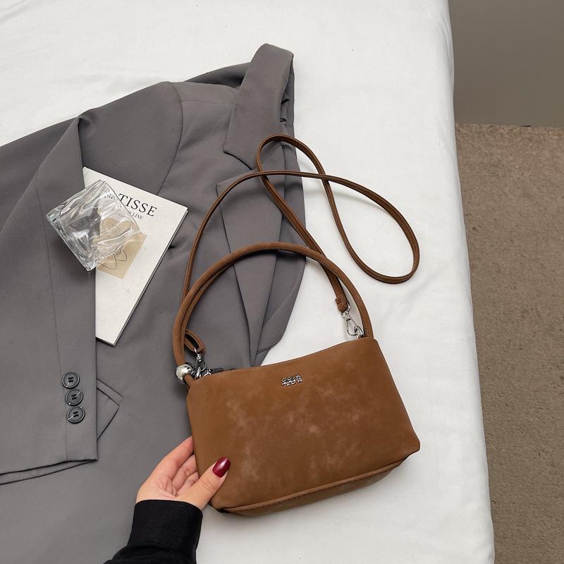 

Hand bag women s 2025 new trendy light luxury niche high-end shoulder bag popular retro messenger bucket bag темно-коричневого