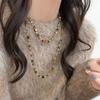 Retro Tiger Eye Stone Necklace - Versatile Maillard Style for Autumn & Winter Sweaters, High-End Luxury Accessory.