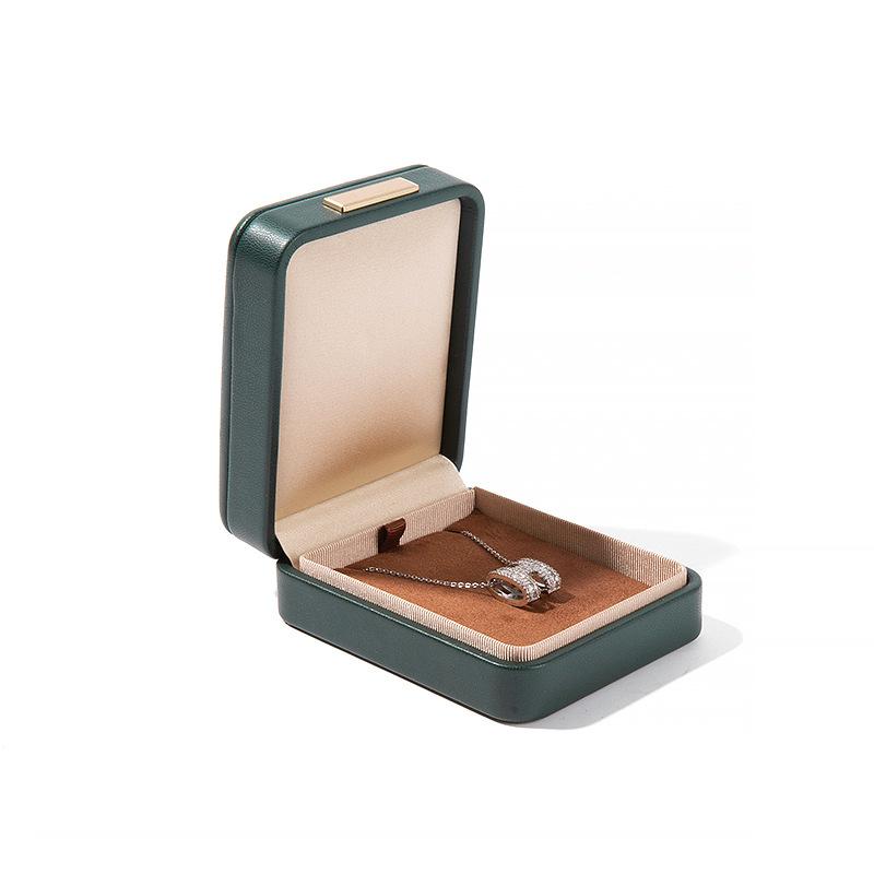 Högkvalitativ PU-läder Rundade Hörn Gyllene Spänne Smyckeskrin Ring Hänge Halsband Armband Förpackning Display Förvaringslåda