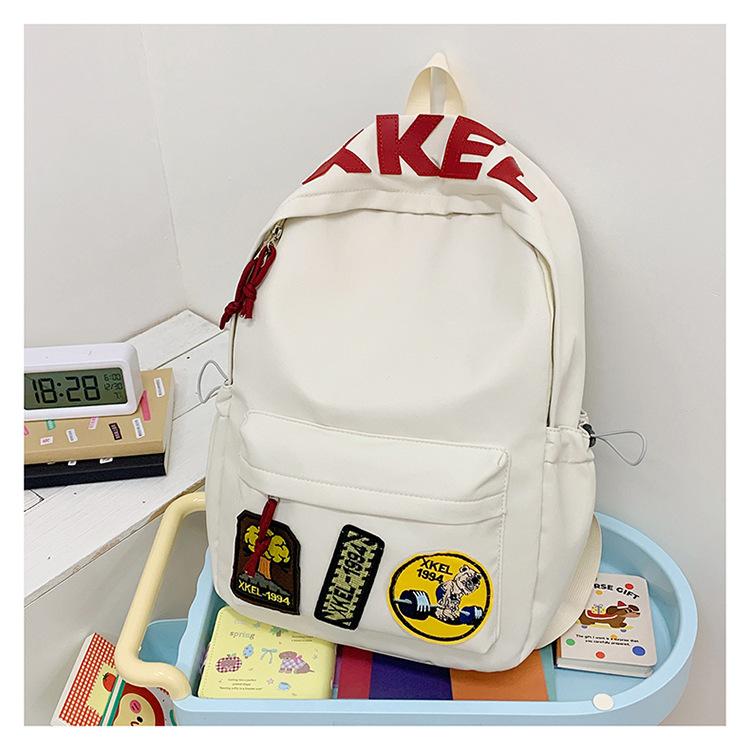 Schoolbag female Korean version ins style high value junior high school student high school student large capacity backpack 1011 new backpack male