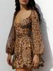 European & American Spring/Summer V-neck Vacation Dress - Sexy Hollow Long Sleeve, Lace-up Backless Skirt for Women