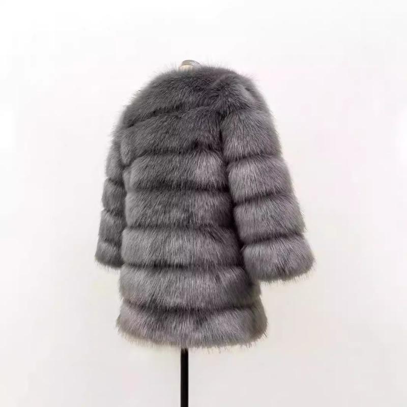 Seven-section splicing jacket women's new autumn and winter clothing temperament fashionable artificial fur imitation fox hair thermal coat