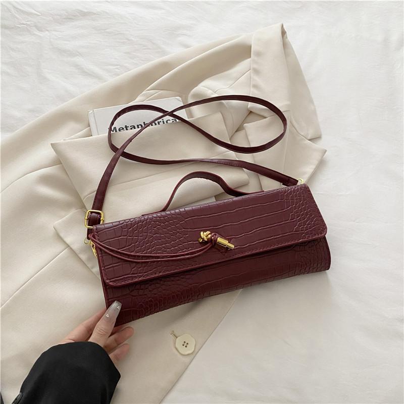 

2 Summer casual simple texture baguette bag personalized trend fashion new women s shoulder messenger bag червоний