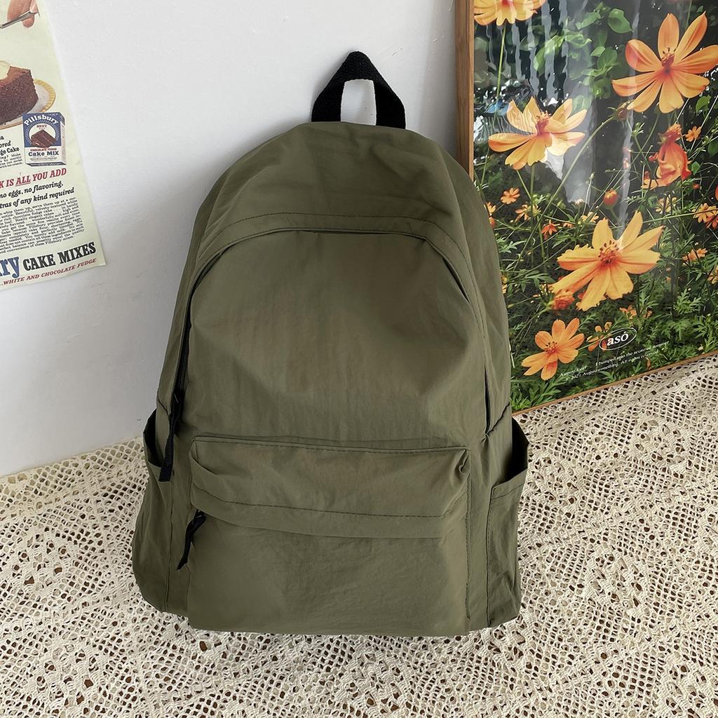 Japanese solid color schoolbag male college student versatile simple travel backpack female high school student large capacity computer backpack