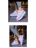Wiederaufladbare LED-Leucht-Rollschuhe für Kinder mit vier Rädern