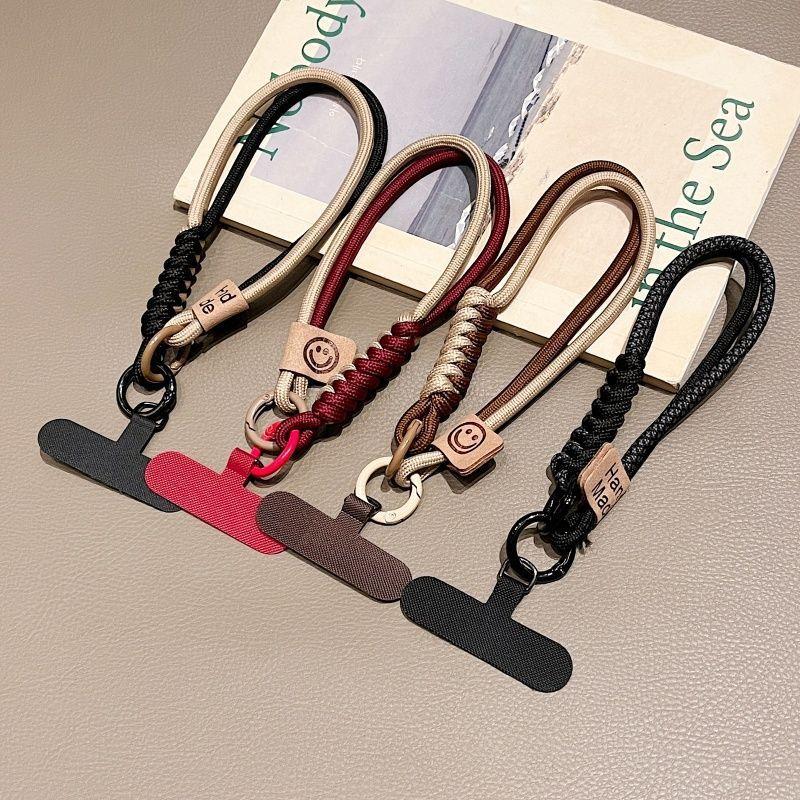 New Short Phone Lanyard With British Style Contrasting Color Weaving and Fashionable Smiling Face Wrist Strap for Phone Cases