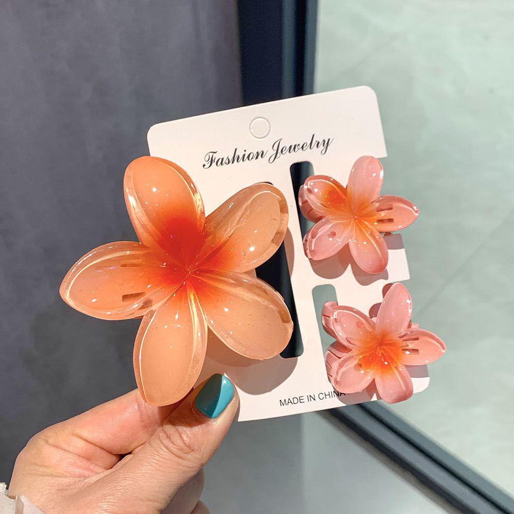 Plumeria Claw Clip: European & American Stylish Hair Accessory for Updos