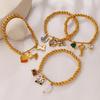 Seaside vacation wind cartoon bear flower DIY multi-pendant gold beaded bracelet summer versatile jewelry