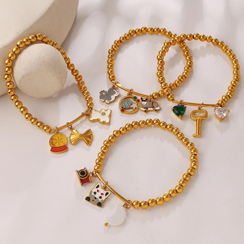 Seaside vacation wind cartoon bear flower DIY multi-pendant gold beaded bracelet summer versatile jewelry