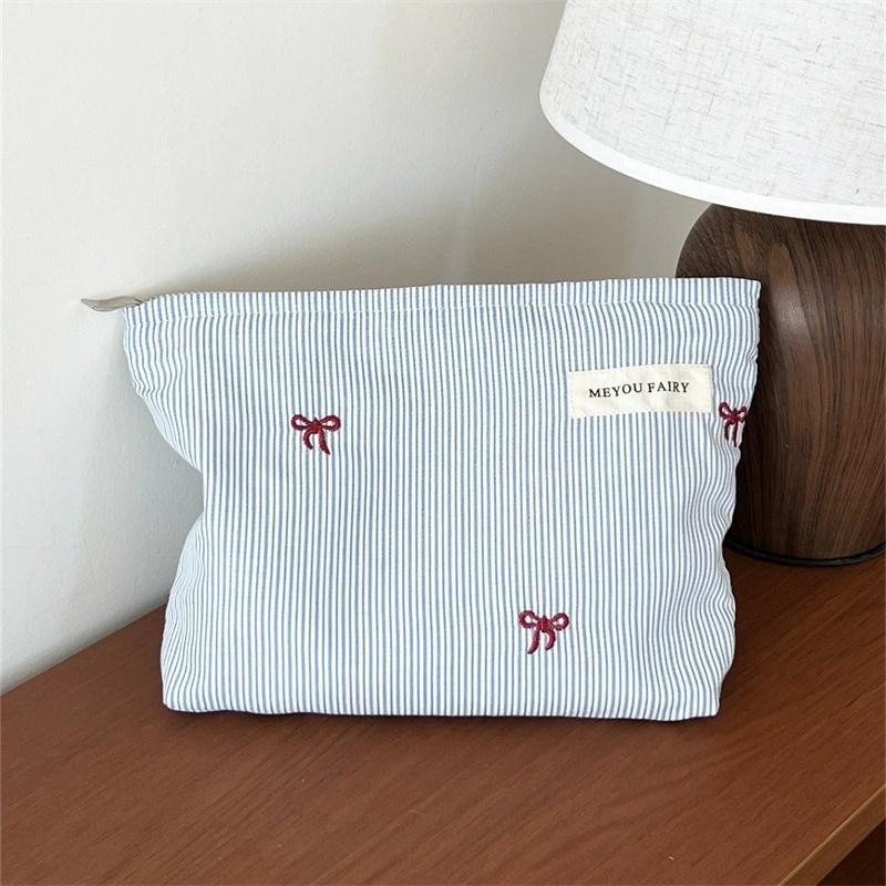 Blue and White Striped Bow Embroidered Makeup Bag, Zippered Storage Bag, Portable Travel Cosmetics and Skincare Storage Bag
