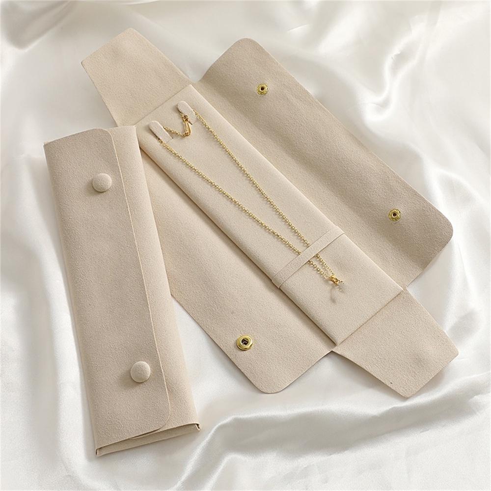 Neue Mikrofaser Halsketten Aufbewahrungstasche Armbandbeutel Tragbare Schmuck Organizer Taschen Damen Multifunktionale Druckknopf-Tasche