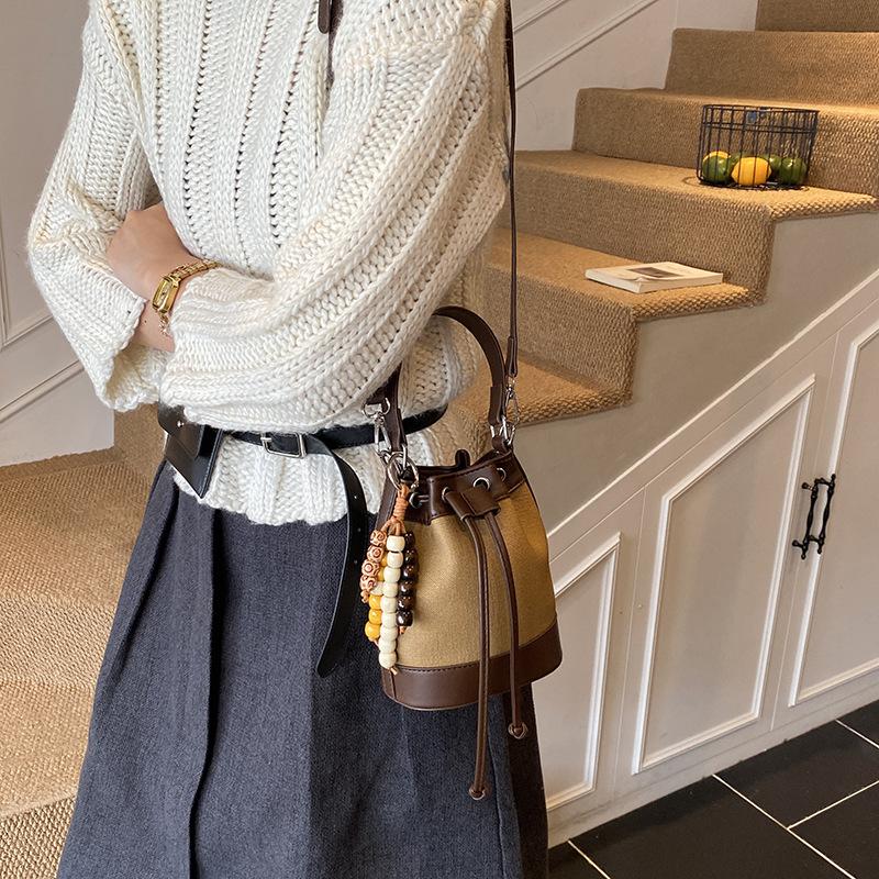 Premium handbag bag women's 2025 new autumn and winter shoulder versatile messenger bag Korean version drawstring hand carrying bucket bag