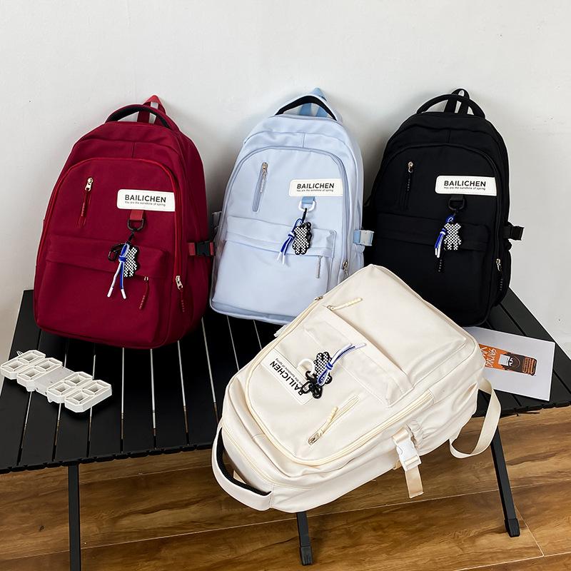 School bag women's fashion new junior high school high school college student large capacity backpack ins simple travel backpack men