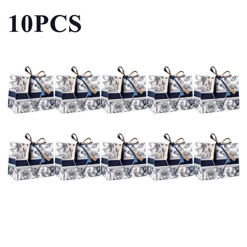 

Подарункові пакети Нові квіткові подарункові пакети INS Fashion Tote Bag зі стрічкою Пакувальний пакет Одяг Паперові сумки для покупок Сумки для цукерок S-18X16X10cm