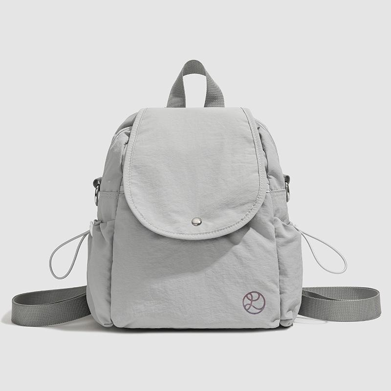 

Small backpack women s new lightweight cloth bag to work commuting leisure sports travel backpack серый