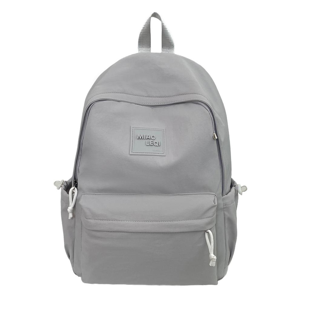 Schoolbag large capacity solid color backpack women's simple lightweight high-end school bag Korean version of junior high school students fashion 