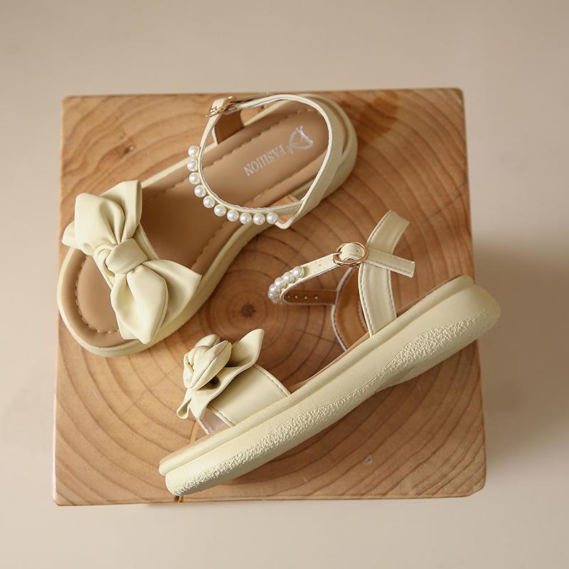 Sandals women's summer new thick-soled versatile pearl bow soft-soled skirt fashion beach shoes