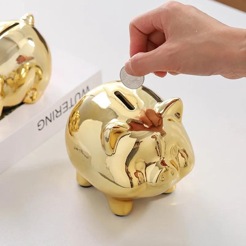 Spardose in Form eines goldenen Keramikschweins – Niedliche Münzspardose – Aufbewahrungsmöglichkeit – Dekoratives Wohnaccessoire – Glücksschwein-Spardose ZG109