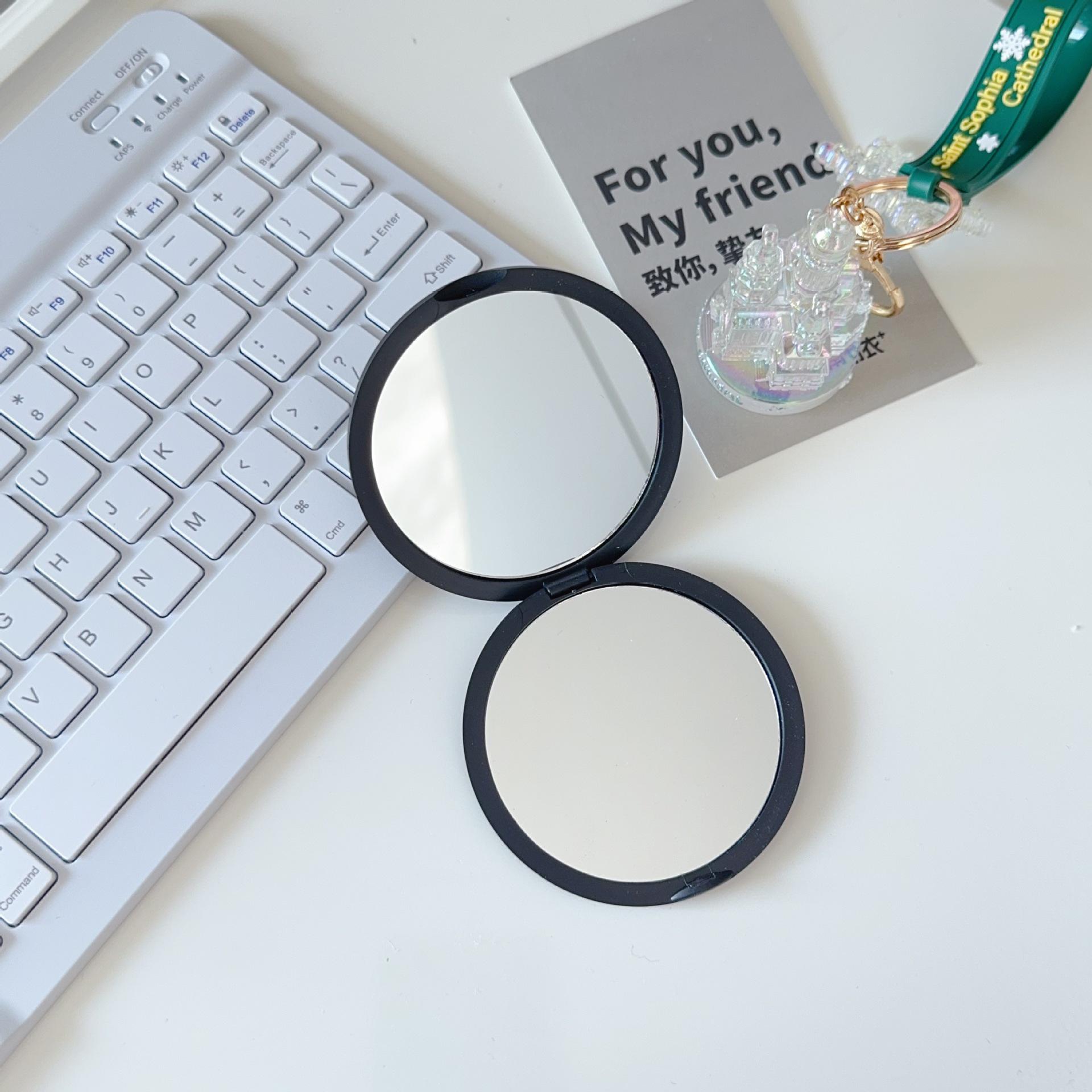 

Compact Double-Sided Foldable Mirror in Macaron Colors – Portable Round Makeup Mirror чорний