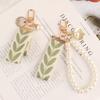 Leaf Pattern Keychain Pearl Shell Pendant Keyrings Wrist Lanyard Key Chain Metal Car Key Holder Decorations for Women