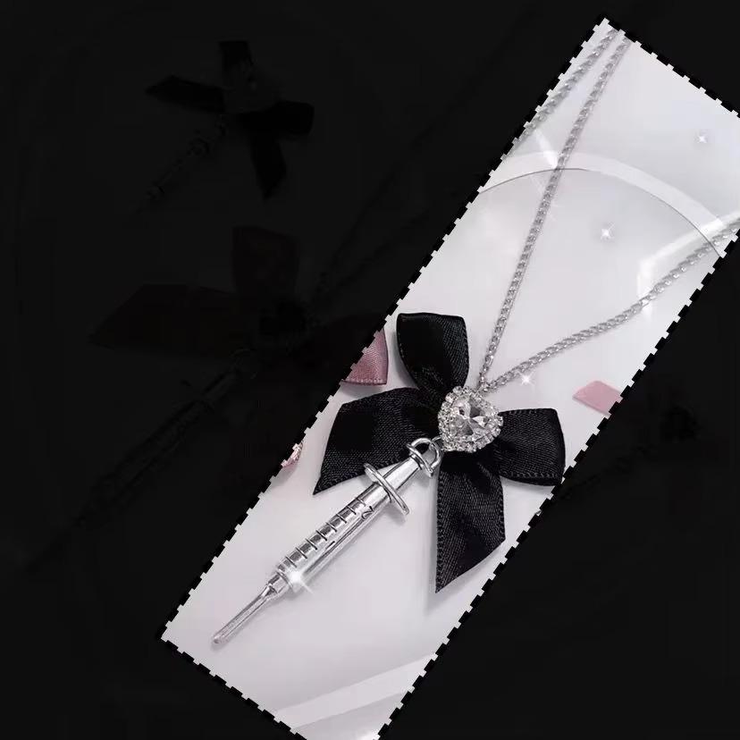 

New Love Heart Bowknot Metal Syringe Pendant Necklace for Women Dark Lolita Cool Trend Jewelry Gothic Fashion Accessories