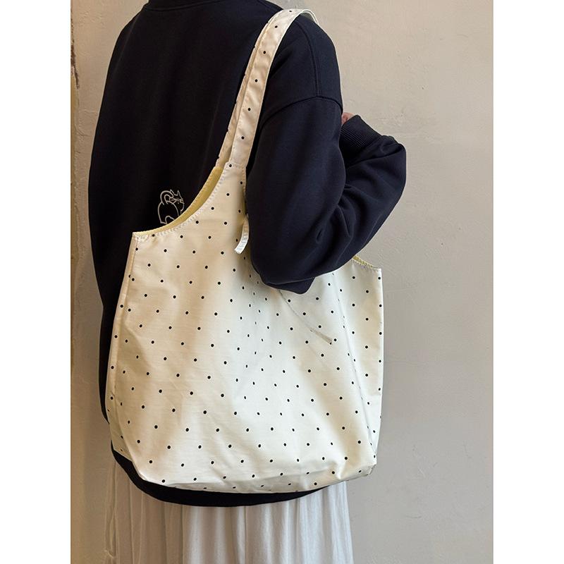 Korean polka dot bow canvas bag women's 2025 new summer shoulder tote bag daily commuter armpit bag
