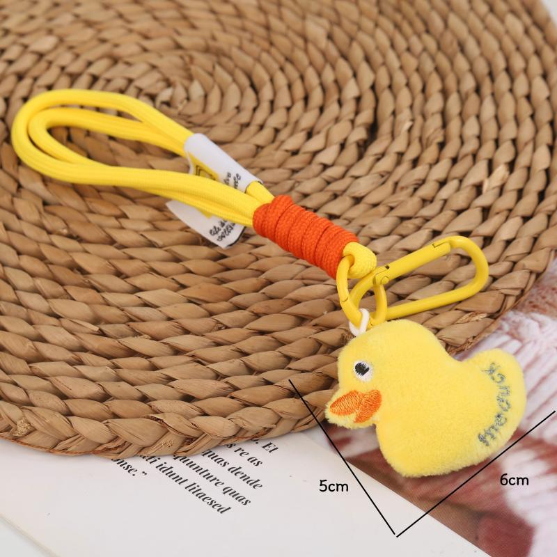 

Плюшевый брелок-подвеска с желтым утенком